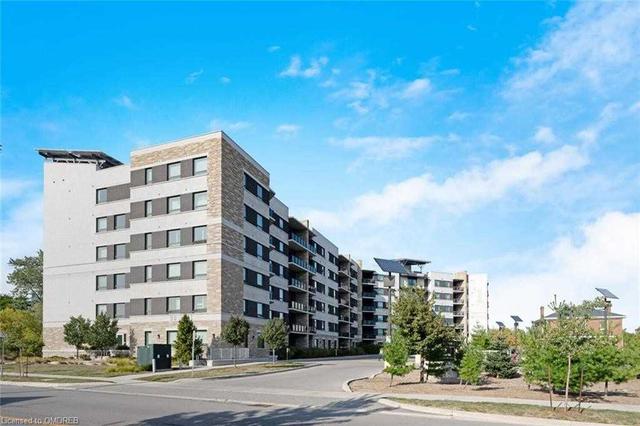 218 - 33 Whitmer St, Condo with 2 bedrooms, 2 bathrooms and 1 parking in Milton ON | Image 1