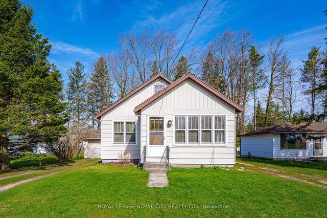 345 Sligo Rd W, House detached with 2 bedrooms, 1 bathrooms and 4 parking in Wellington North ON | Image 1
