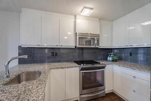 209 - 45 Aspenmont Heights Sw, Condo with 2 bedrooms, 1 bathrooms and 2 parking in Calgary AB | Image 12