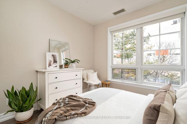 112 - 21 Burkebrook Pl, Condo with 2 bedrooms, 2 bathrooms and 1 parking in Toronto ON | Image 14