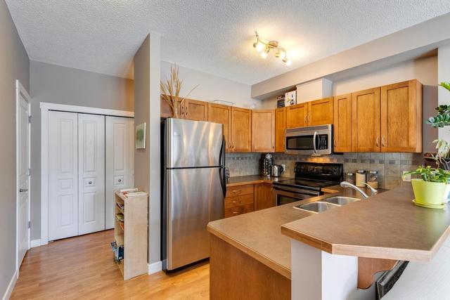2101 - 211 Aspen Stone Boulevard Sw, Condo with 1 bedrooms, 1 bathrooms and 1 parking in Calgary AB | Image 1
