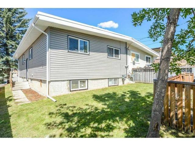 5834 Dalgleish Road Nw, Home with 5 bedrooms, 2 bathrooms and 2 parking in Calgary AB | Image 26