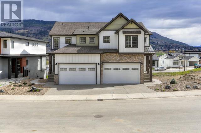 313 Arrowleaf Rise, House detached with 3 bedrooms, 2 bathrooms and 4 parking in Coldstream BC | Image 2