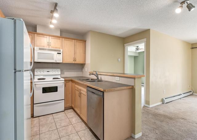 1211 - 70 Panamount Drive Nw, Condo with 2 bedrooms, 2 bathrooms and 1 parking in Calgary AB | Image 10