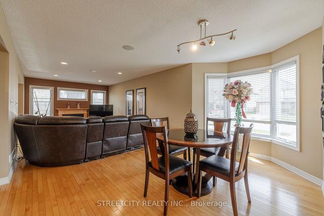 1434 Evans Blvd N, House attached with 4 bedrooms, 3 bathrooms and 3 parking in London ON | Image 39