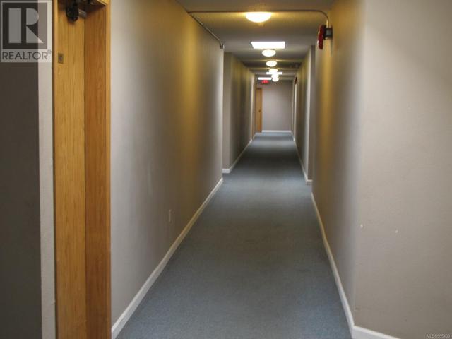 View Of The Hallway After Exiting Elevator, On Way To The Suite | Image 24