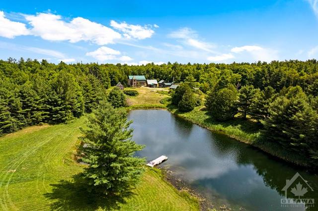 12059 Road 509 Road, House detached with 5 bedrooms, 5 bathrooms and 20 parking in North Frontenac ON | Image 3