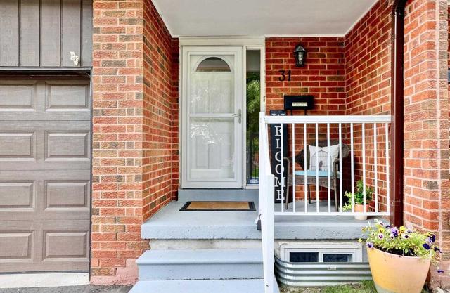 31 - 750 Burnhamthorpe Rd E, Townhouse with 4 bedrooms, 2 bathrooms and 2 parking in Mississauga ON | Image 1