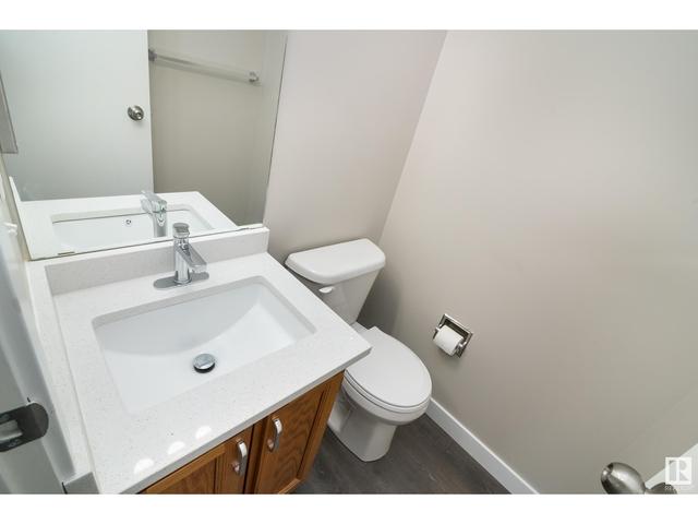 849 Village Dr, House attached with 3 bedrooms, 1 bathrooms and 2 parking in Edmonton AB | Image 3