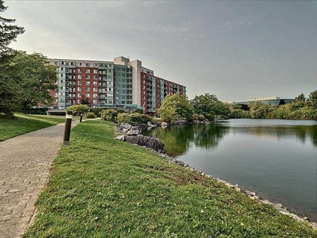 114 - 30 Blue Springs Dr, Condo with 2 bedrooms, 2 bathrooms and 1 parking in Waterloo ON | Image 1