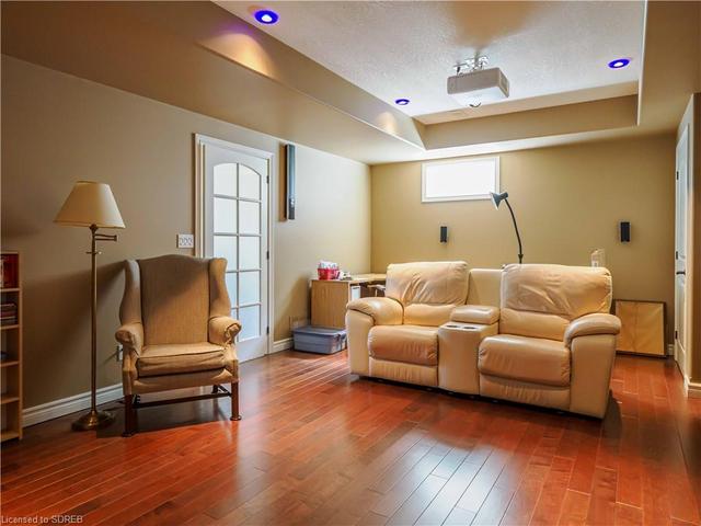 Recreation Room in walk out basement.  Lots of light in this basement, California shutters and harwood floors | Image 25