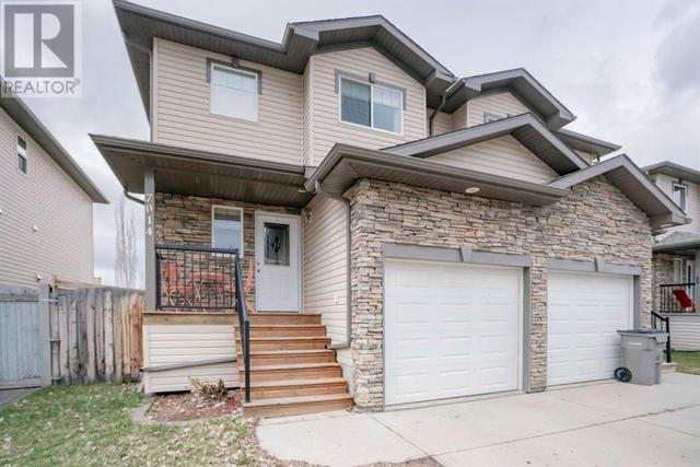 7014 113 Street, House semidetached with 3 bedrooms, 2 bathrooms and 2 parking in Grande Prairie AB | Card Image