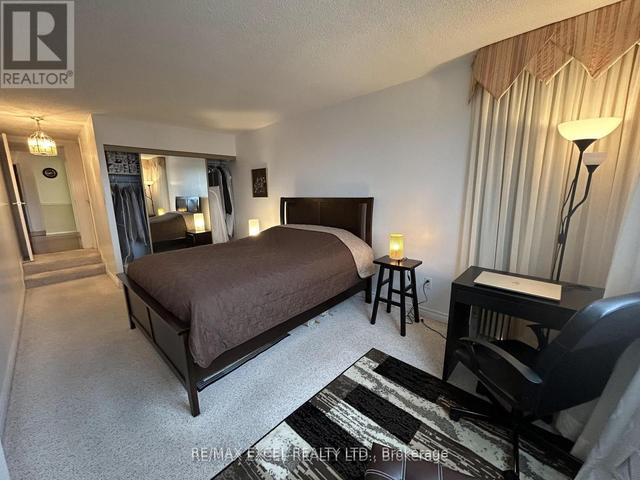 1210 - 2350 Bridletowne Circ, Condo with 2 bedrooms, 2 bathrooms and 1 parking in Toronto ON | Image 2