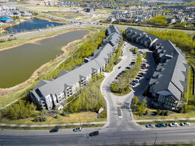 211 - 35 Aspenmont Heights Sw, Condo with 2 bedrooms, 2 bathrooms and 1 parking in Calgary AB | Image 2