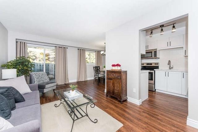 42 - 907 Burns St W, Townhouse with 3 bedrooms, 2 bathrooms and 2 parking in Whitby ON | Image 2