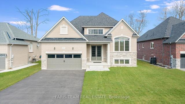 13 Fawndale Cres, House detached with 2 bedrooms, 3 bathrooms and 6 parking in Wasaga Beach ON | Image 1