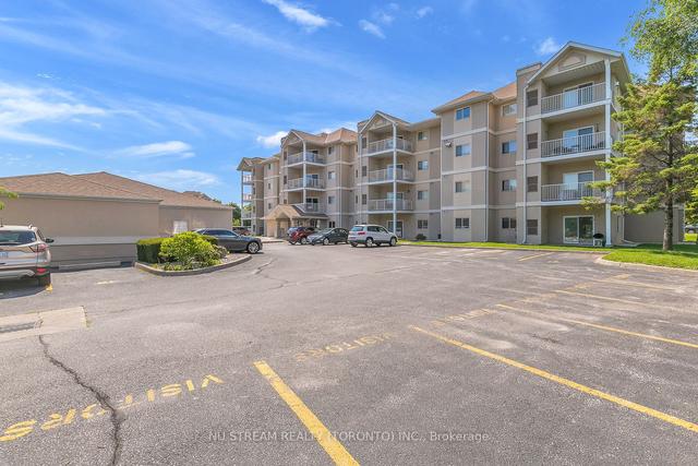 404 - 1535 Grand Marais Rd W, Condo with 2 bedrooms, 2 bathrooms and 1 parking in Windsor ON | Image 12