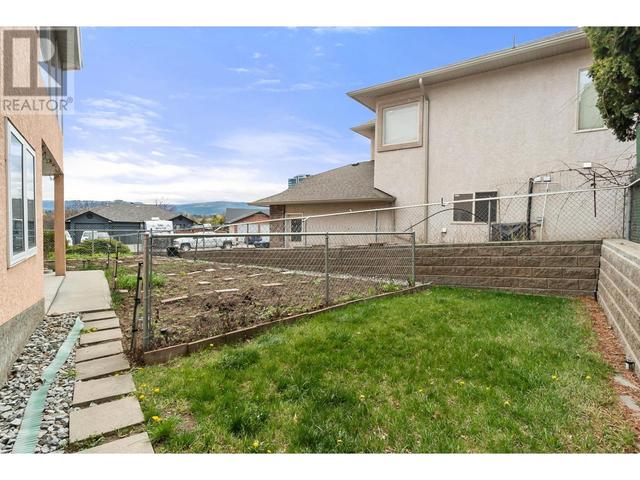 1531 Lawrence Avenue, House detached with 4 bedrooms, 3 bathrooms and 8 parking in Kelowna BC | Image 52
