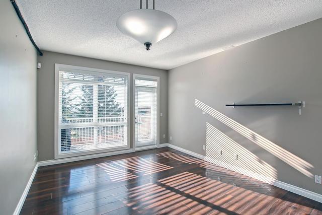 12 - 117 Rockyledge View Nw, Home with 2 bedrooms, 2 bathrooms and 2 parking in Calgary AB | Image 7