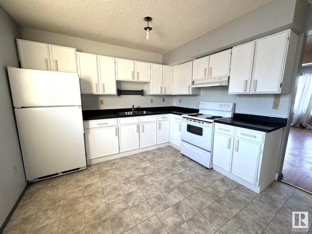 4705 & 4707 48 Av, House attached with 4 bedrooms, 1 bathrooms and null parking in Yellowhead County AB | Image 2