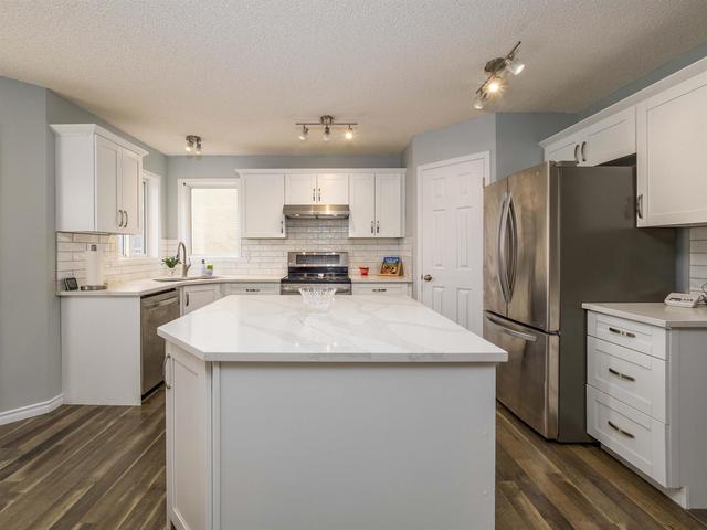 6 Sierra Nevada Green Sw, House detached with 4 bedrooms, 3 bathrooms and 4 parking in Calgary AB | Image 3