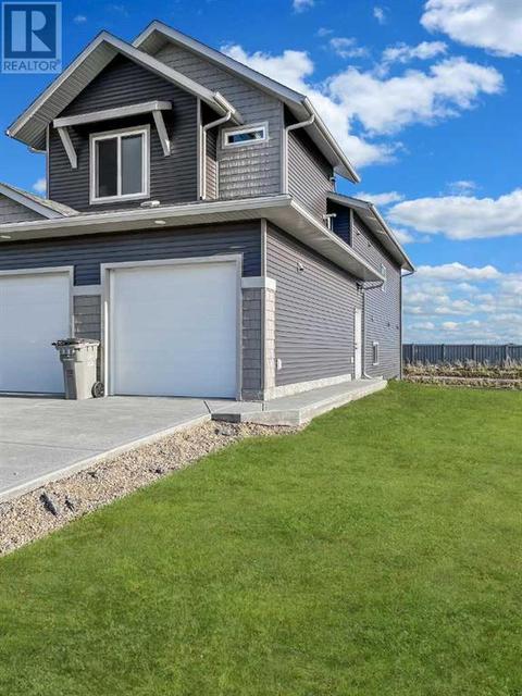 10529 133 Avenue, Home with 3 bedrooms, 2 bathrooms and null parking in Grande Prairie AB | Card Image