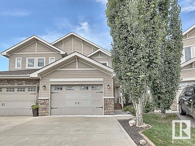 4911 214 St Nw Nw, House semidetached with 3 bedrooms, 2 bathrooms and 2 parking in Edmonton AB | Card Image