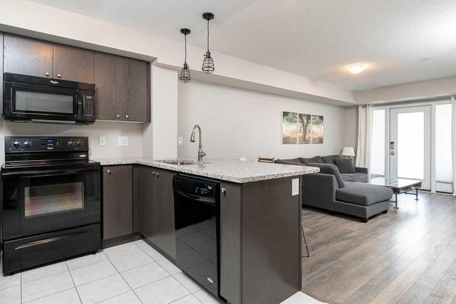 111 - 1045 Nadalin Hts, Condo with 1 bedrooms, 1 bathrooms and 1 parking in Milton ON | Image 4