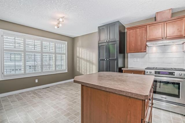 80 Crystal Shores Cove, Home with 3 bedrooms, 2 bathrooms and 2 parking in Calgary AB | Image 20