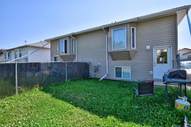 9216 94a Avenue, Home with 5 bedrooms, 3 bathrooms and 4 parking in Grande Prairie AB | Image 2