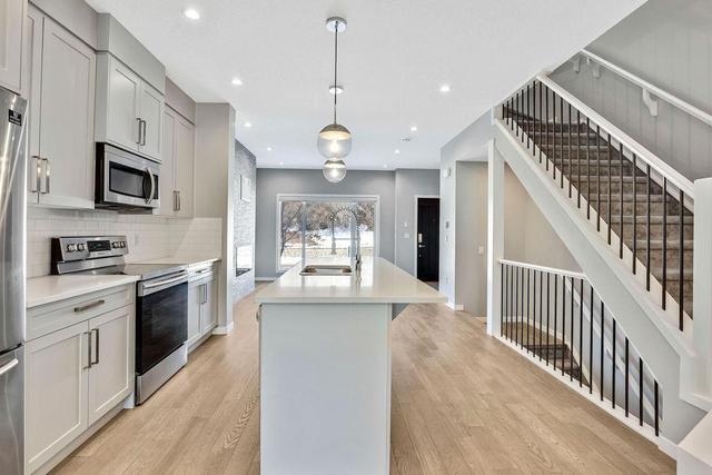 3304 2 Street Ne, Home with 4 bedrooms, 3 bathrooms and 1 parking in Calgary AB | Image 4