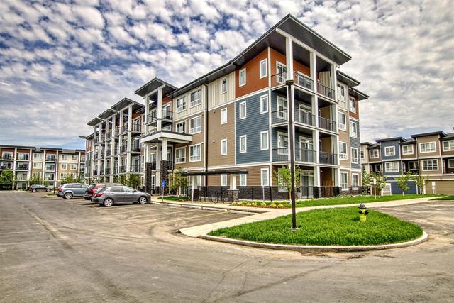 108 - 25 Walgrove Walk Se, Condo with 2 bedrooms, 2 bathrooms and 1 parking in Calgary AB | Image 1