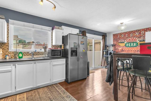 14760 Deer Ridge Drive Se, Home with 3 bedrooms, 1 bathrooms and 1 parking in Calgary AB | Image 6