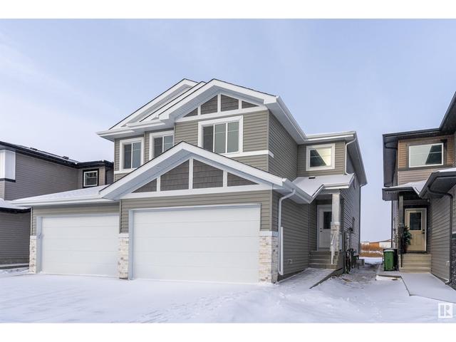 6522 176 Av Nw, House semidetached with 3 bedrooms, 2 bathrooms and null parking in Edmonton AB | Card Image