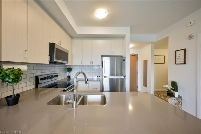 318 - 1105 Leger Way, House attached with 1 bedrooms, 1 bathrooms and 1 parking in Milton ON | Image 10