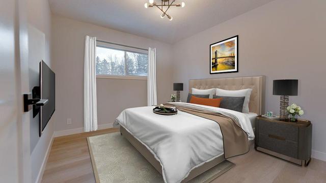 215 Tache Avenue Nw, House detached with 5 bedrooms, 2 bathrooms and 4 parking in Calgary AB | Image 3
