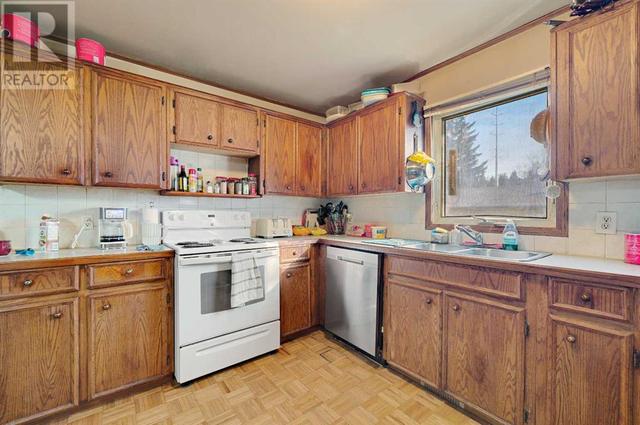 5220 19 Avenue Nw, House detached with 4 bedrooms, 2 bathrooms and 5 parking in Calgary AB | Image 9