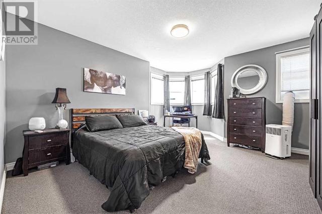 A Large Primary Bedroom With A Great Bay Window | Image 15