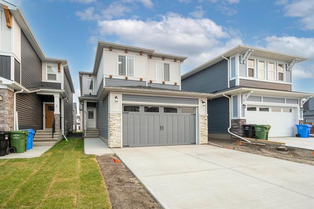65 Carringsby Way Nw, House detached with 3 bedrooms, 2 bathrooms and 2 parking in Calgary AB | Image 1