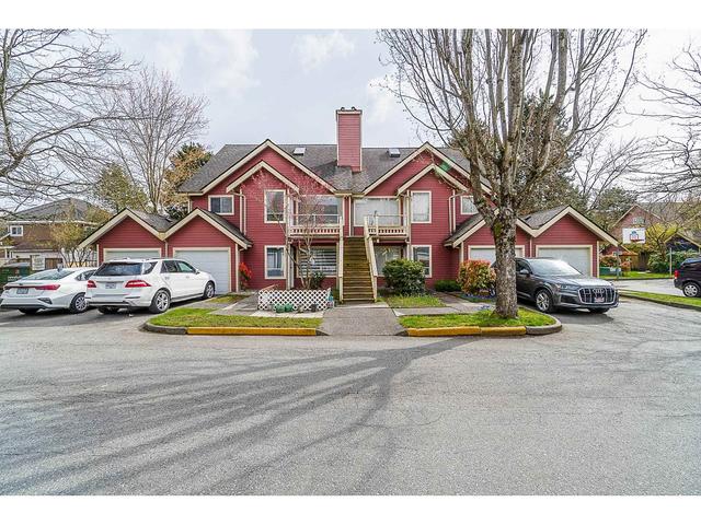 211 - 7838 120a Street, House attached with 4 bedrooms, 2 bathrooms and 2 parking in Surrey BC | Card Image