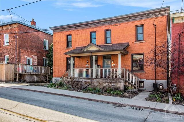 236 Booth Street, Home with 4 bedrooms, 2 bathrooms and 1 parking in Ottawa ON | Image 2
