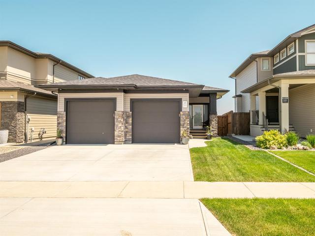 335 Canyon Meadows Road W, House detached with 4 bedrooms, 2 bathrooms and 4 parking in Lethbridge AB | Image 1