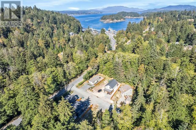 aerial photo from Sept 2022, this lot is at the top left of the subdivision. Cove Crescent is in a great walkable location, close to the ferry and shopping plaza! | Image 4