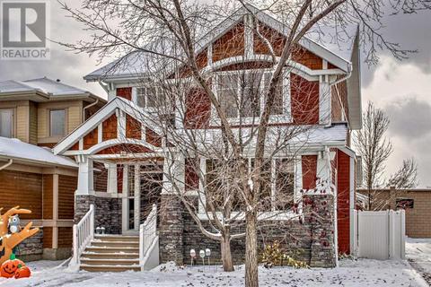 128 Mike Ralph Way Sw, House detached with 4 bedrooms, 3 bathrooms and 2 parking in Calgary AB | Card Image