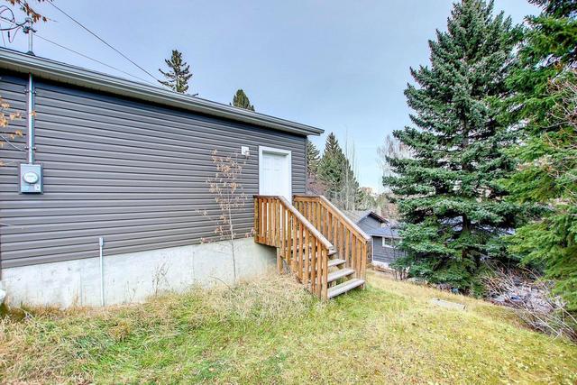 36 Hutton Crescent Sw, House detached with 3 bedrooms, 2 bathrooms and 2 parking in Calgary AB | Image 43