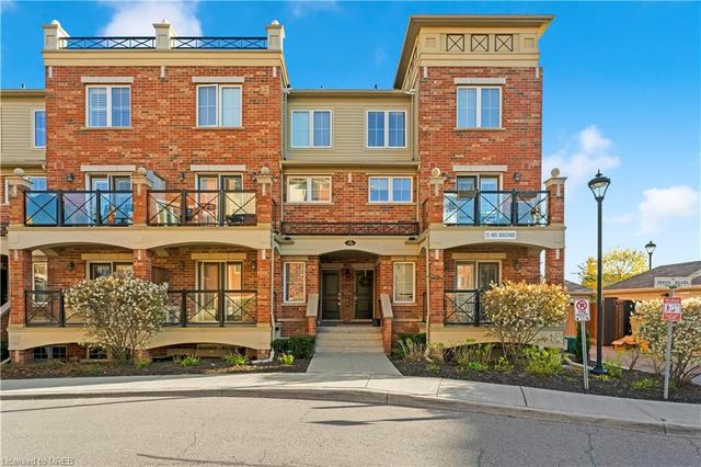 8 - 35 Hays Boulevard, House attached with 2 bedrooms, 1 bathrooms and 2 parking in Oakville ON | Image 1