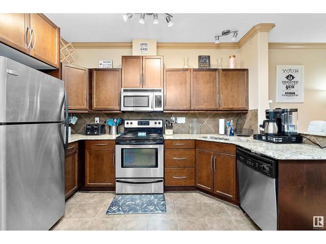 227 - 10121 80 Av Nw, Condo with 2 bedrooms, 2 bathrooms and 2 parking in Edmonton AB | Image 9