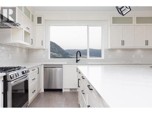 579 Barra Lane, House detached with 8 bedrooms, 6 bathrooms and 5 parking in Kelowna BC | Image 14