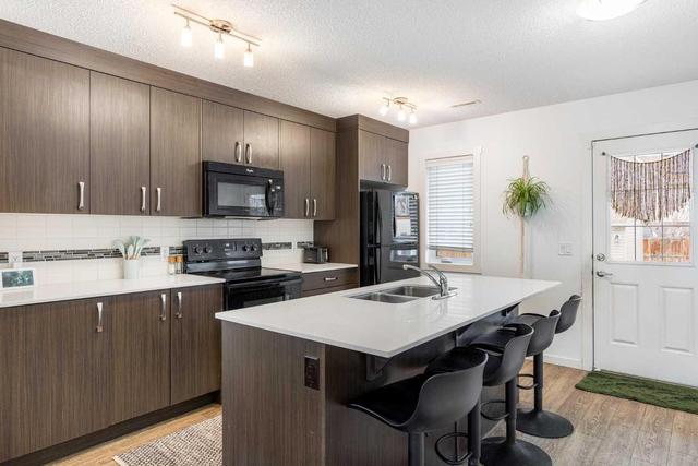 1315 Auburn Bay Circle Se, Home with 2 bedrooms, 2 bathrooms and 3 parking in Calgary AB | Image 10