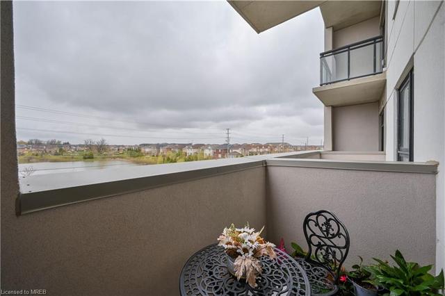 318 - 1105 Leger Way, House attached with 1 bedrooms, 1 bathrooms and 1 parking in Milton ON | Image 26